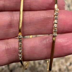 pair of crystal and gold bangle bracelets